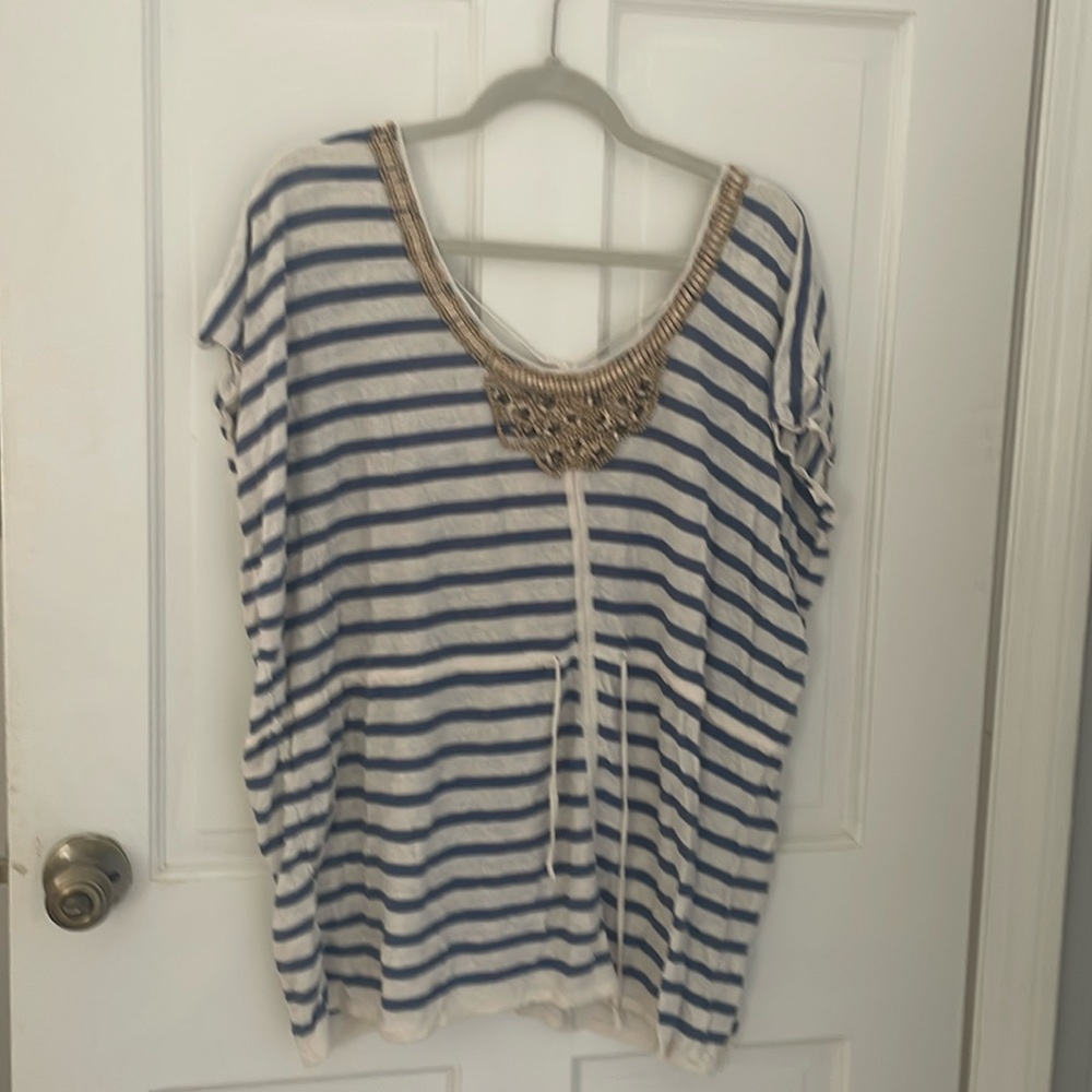 Super cute bathing suit cover up.
